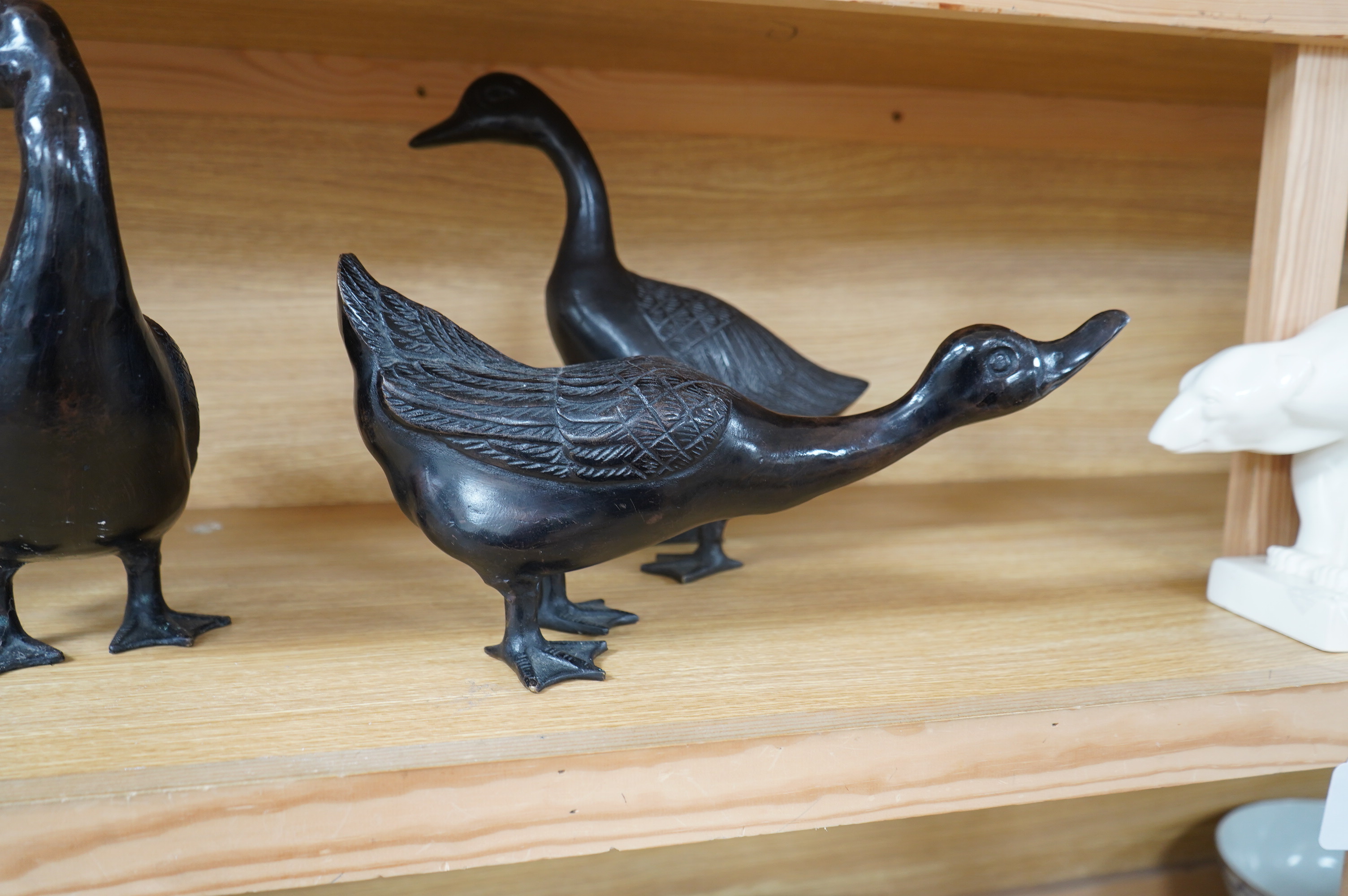 Three contemporary bronze models of ducks, tallest 31cm. Condition - fair to good